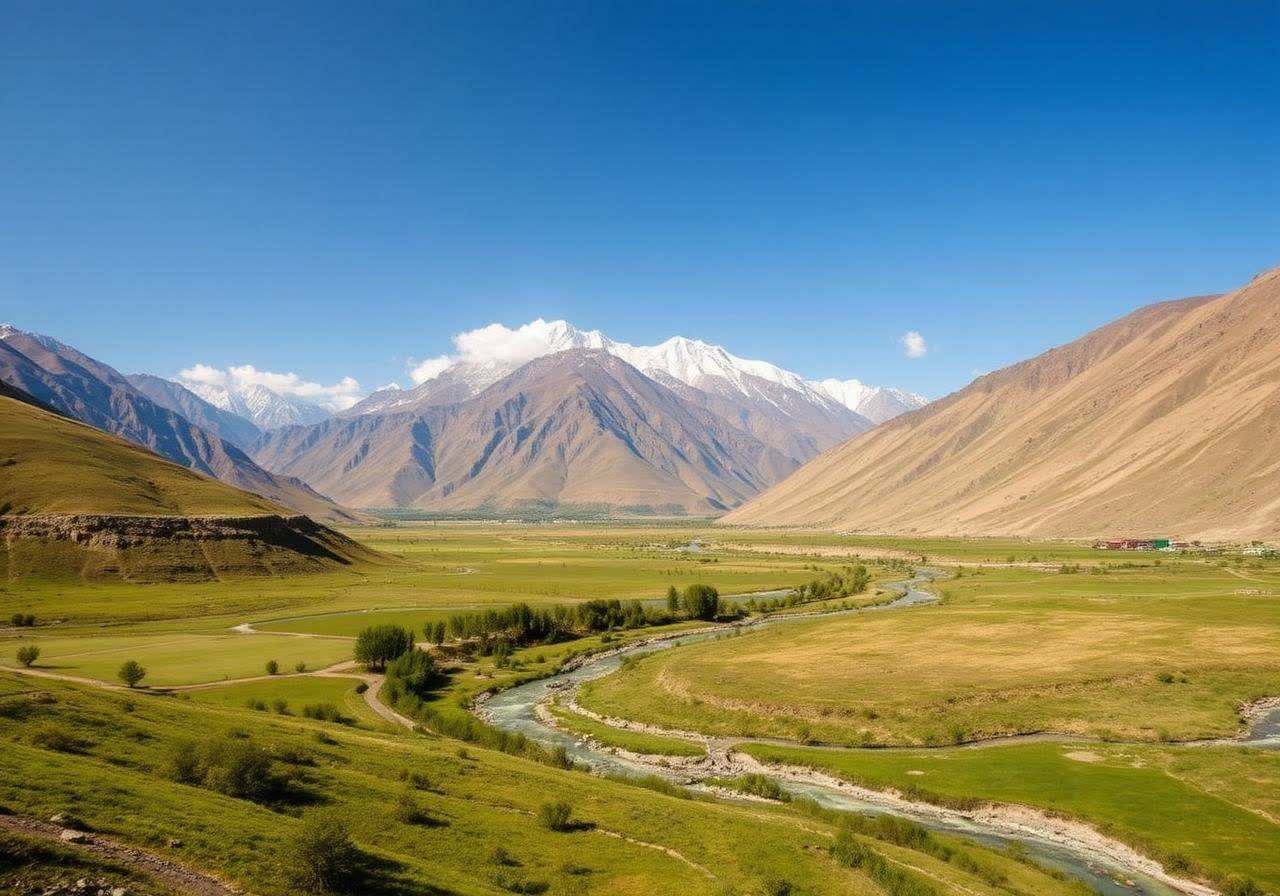 Chitral valley in summer with the Hindukush mountains and Tirich Mir behind