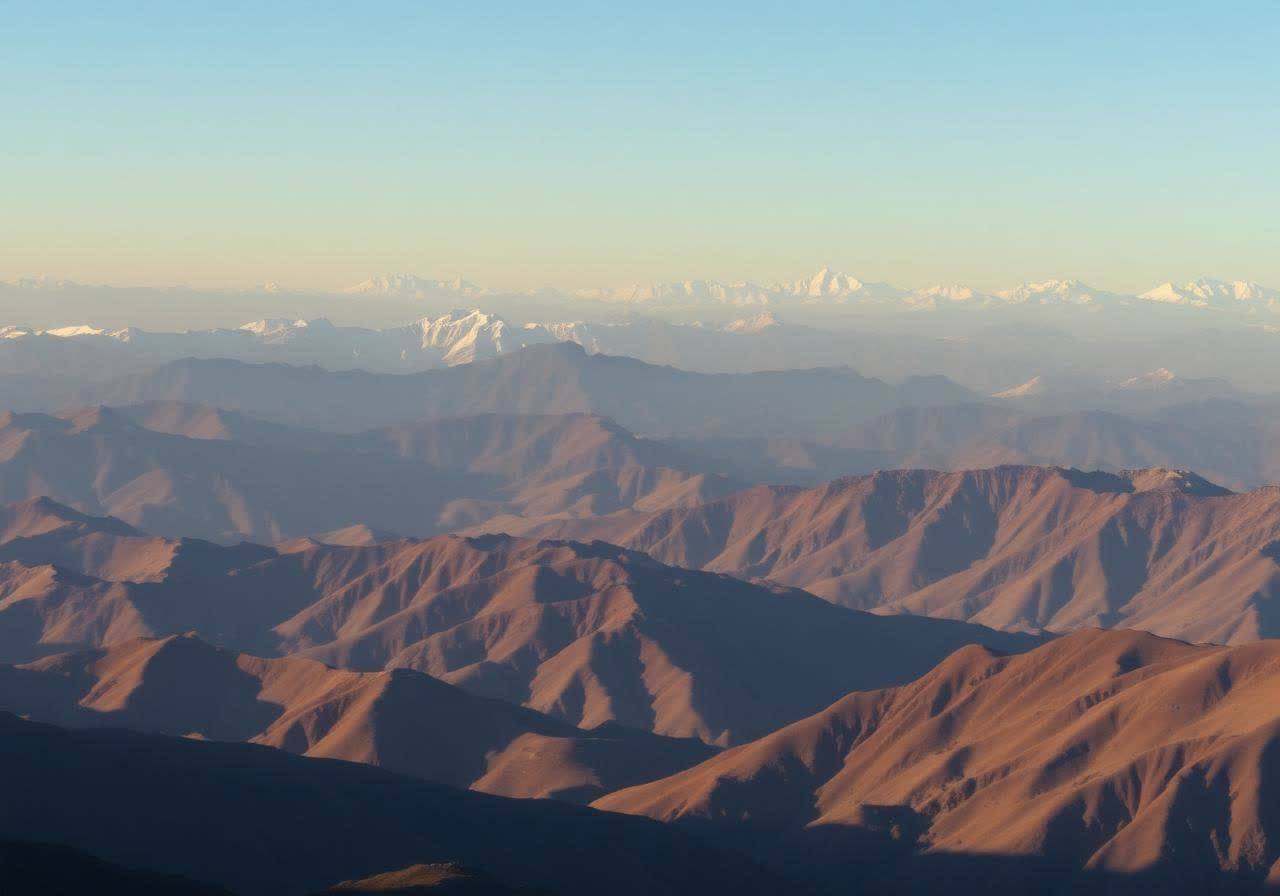 Layered mountain ranges of northern Pakistan fading into distance
